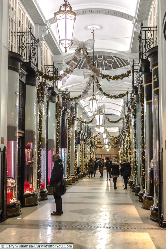 Picadilly Arcade, a row of bespoke shops, in an ornate pedestrian thoroughfare in the west end of London, selling the finer things in life