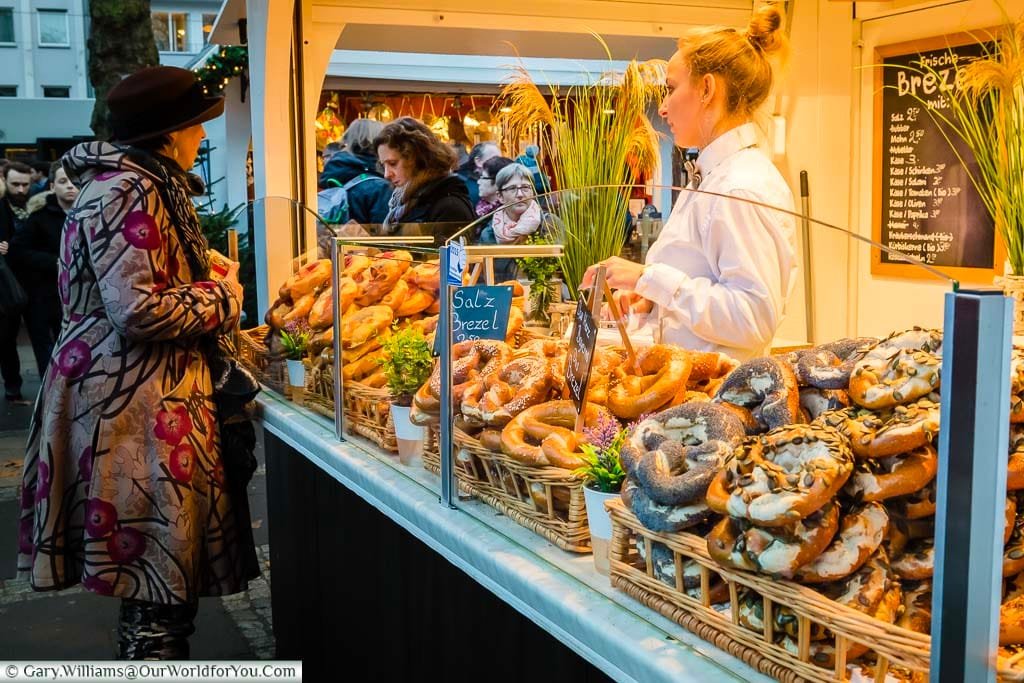 A stall dedicated to artisan Pretzels, or Brezels, with a wide range available on the Angel Christmas Market in Cologne.