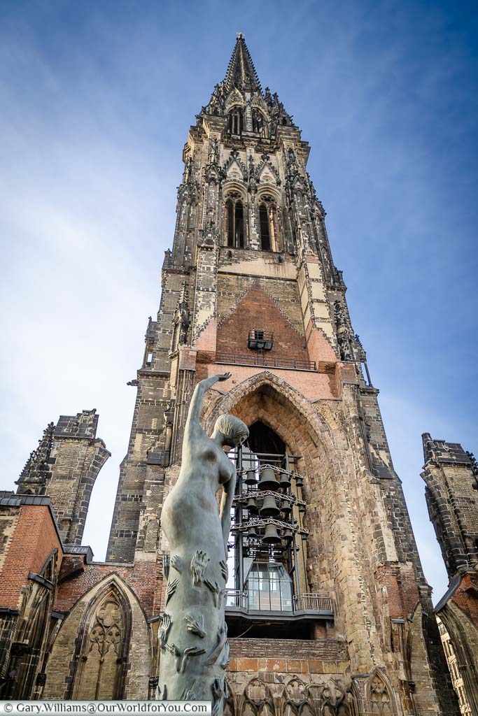 Looking up at the tower of bombed of St Nikolai-church tower from the nave. This ruined church has now become a memorial and museum to the bombing of Hamburg during the Second World war.