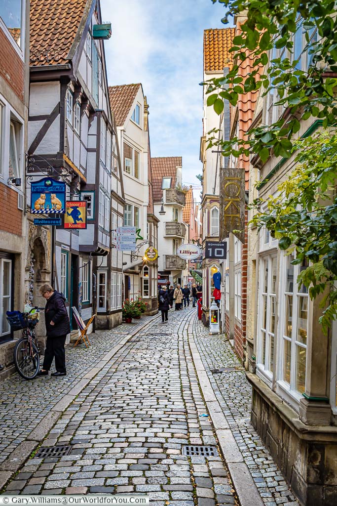 A cobbled lane between historic buildings in the Schnoor neighbourhood of Bremen, Germany