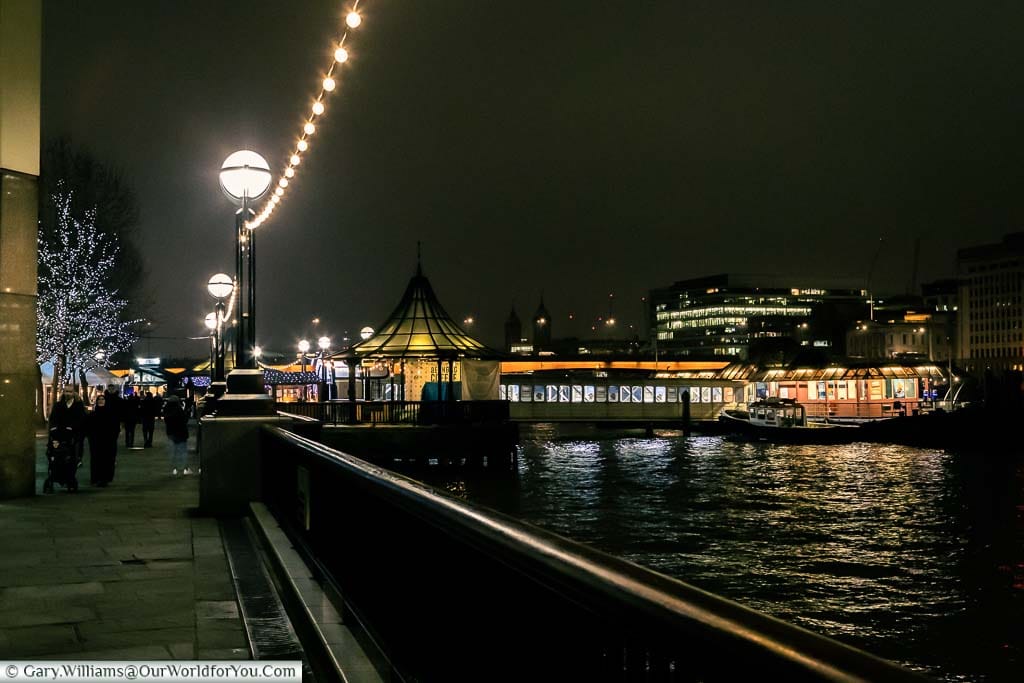 The footpath alongside London Bridge City Pier at Christmas