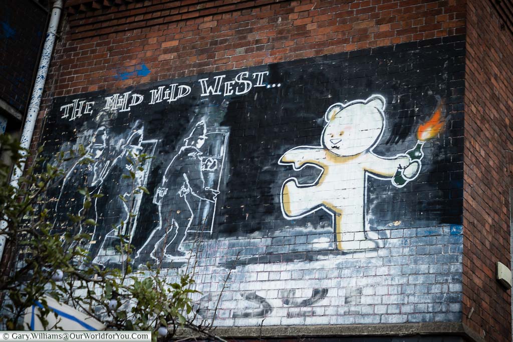 The Banksy piece 'The Mild Mild West' depicting a teddy bear throwing a petrol bomb at riot police