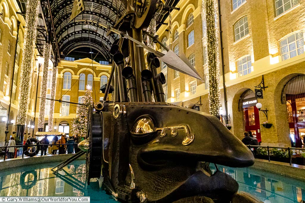 A close-up of the art installation ‘The Navigators’, a surrealist ship with a large face, in Hay’s Galleria at Christmas.
