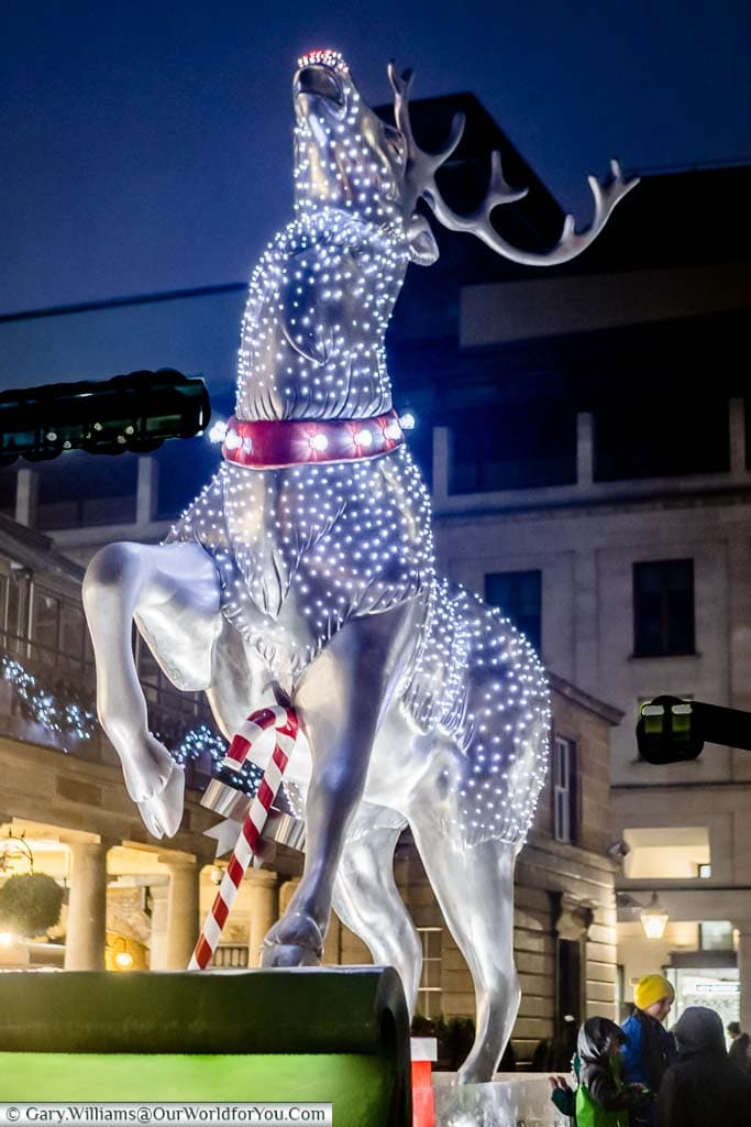A giant illuminated model reindeer outside Covent Garden in London for Christmas.