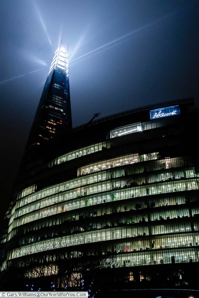 The illuminated tip of the Shard at Christmas from Duke Street Hill in London