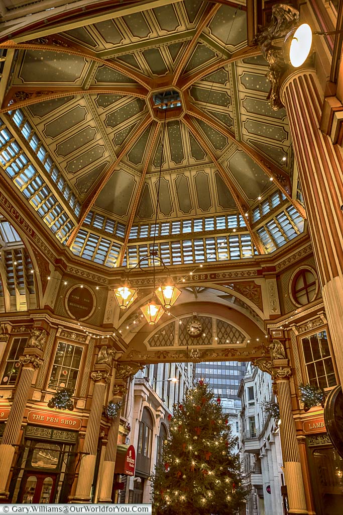 The Christmas Tree in the centre of Leadenhall market under its ornate cast-iron roof