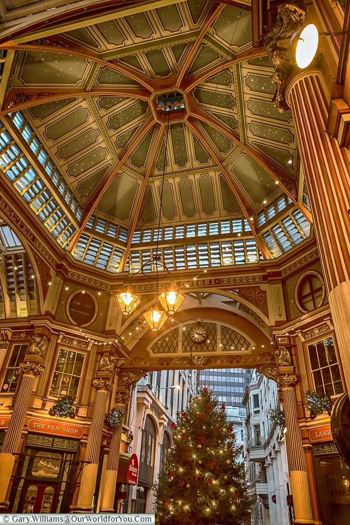 The Christmas Tree in the centre of Leadenhall market under its ornate cast-iron roof