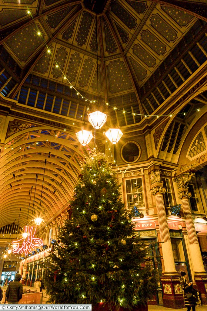 The Christmas tree at the centre of the ornate Leadenhall Market in the City of London