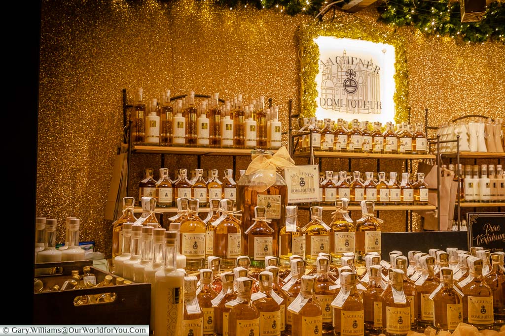 A German Christmas Markets stall in Aachen selling bottles of Aachener Dom Liqueur