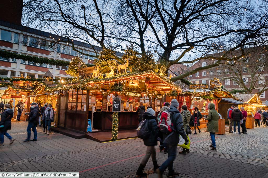 Christmas Markets stalls in Münster’s Weihnachtsmarkt just as dusk approaches