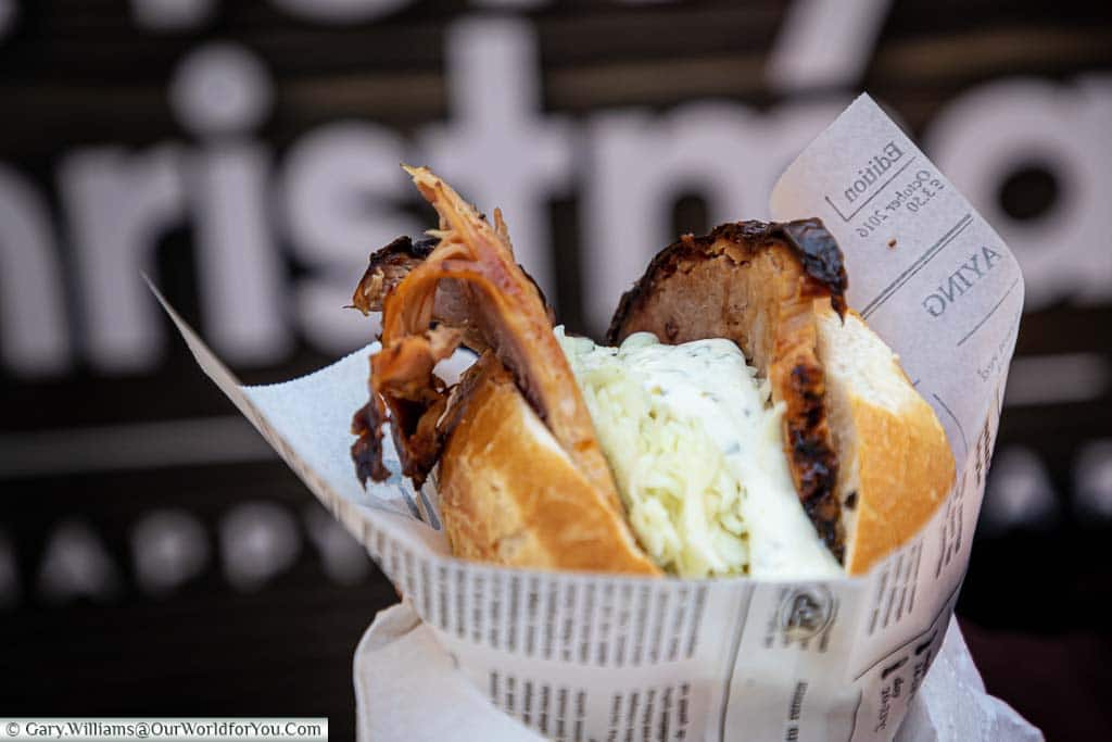 A bap filled with rotisserie ham, coleslaw and a sour cream sauce from Münster's Christmas Markets