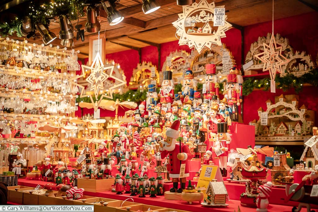 A stall full of wooden figures and toy soldiers decorations on Aachen's Christmas Markets
