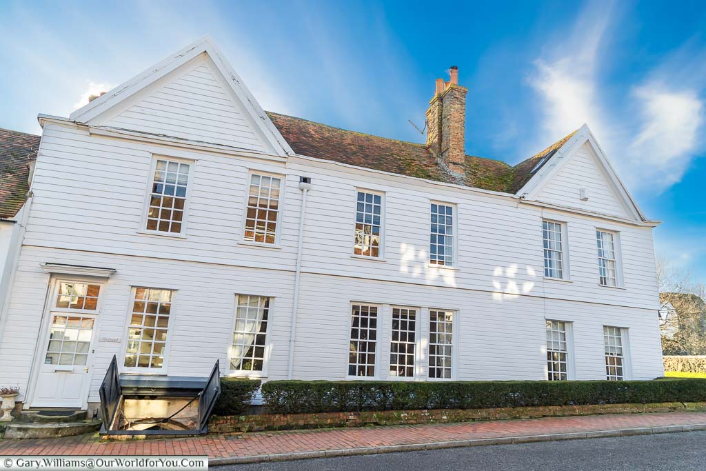 The white weatherboarded Firebrand House with its historic cellars in Winchelsea