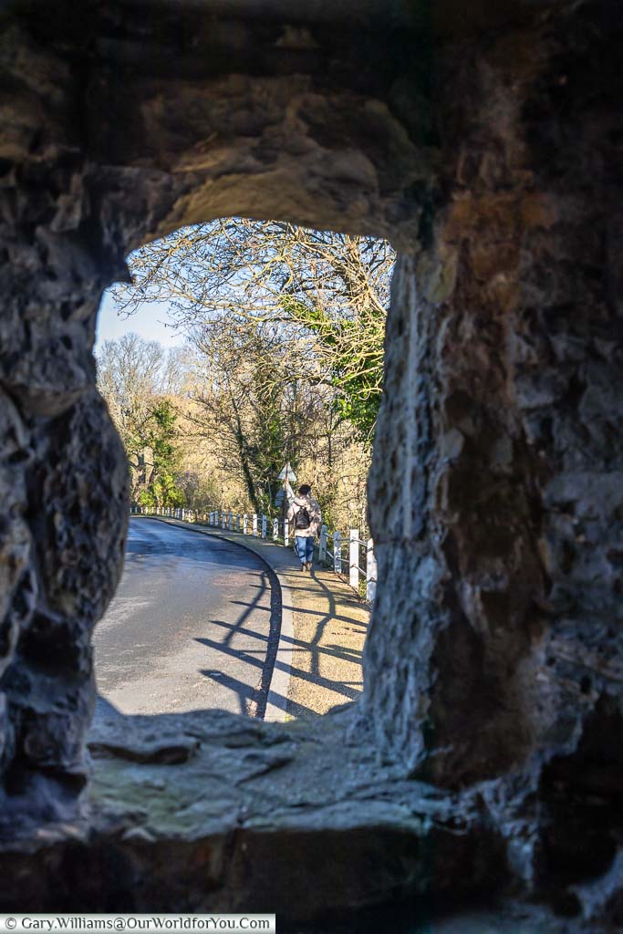 A view through the Strand Gate to the road leading out of Winchelsea