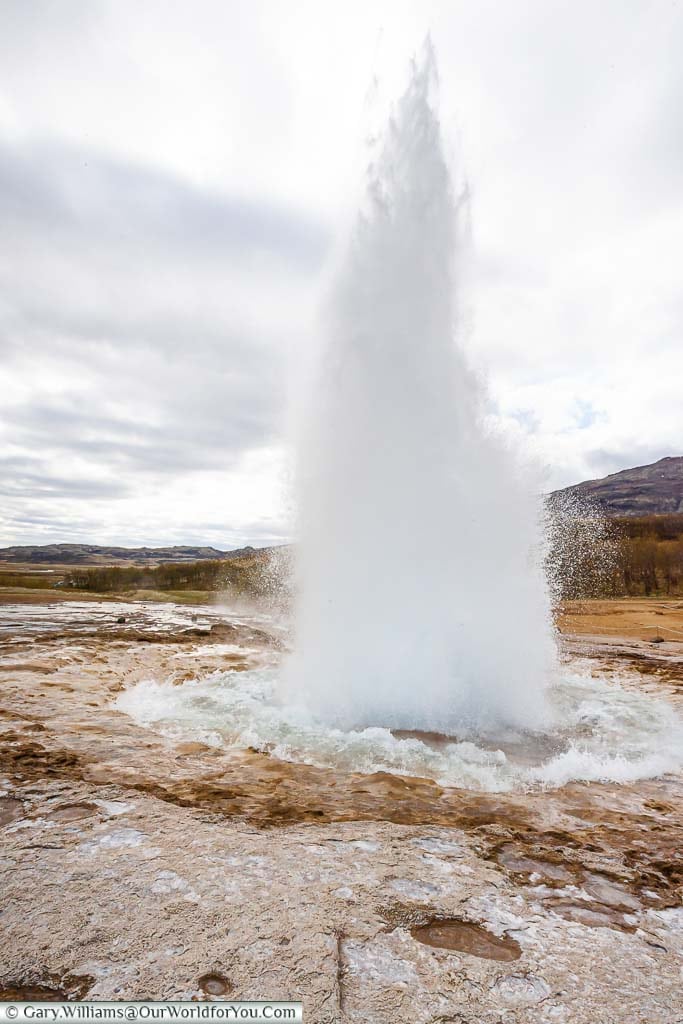 The eruption of Strokkur, Iceland most famous active geyser, in the Haukadalur geothermal region on the Golden Circle