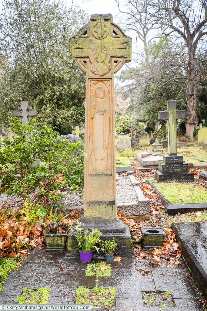 A small plot with an ornate headstone to Emmeline Pankhurst within the Brompton Cemetery in London