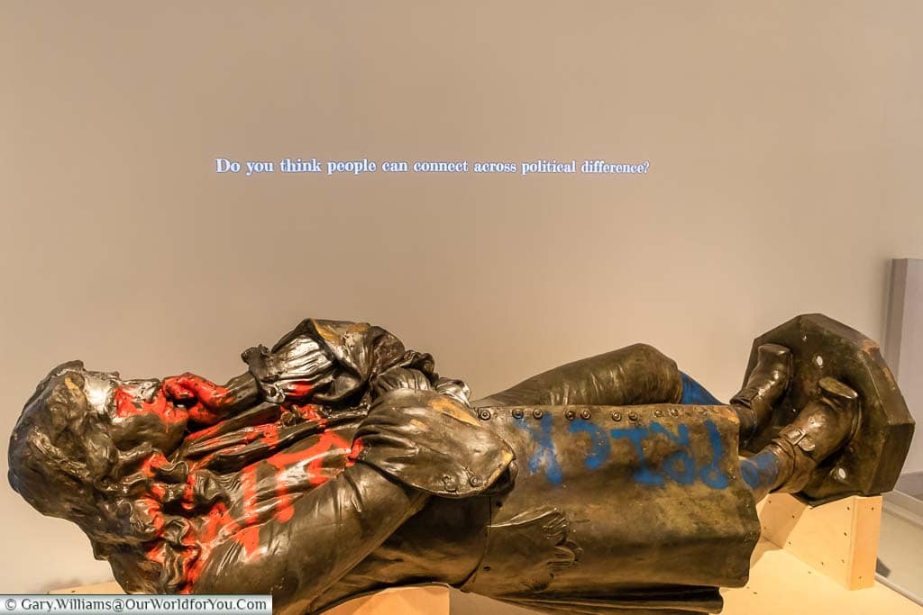 The graffitied toppled statue of Edward Colston inside the M Shed Museum in Bristol