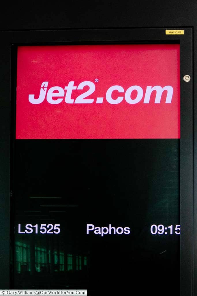 The departure board for the Jet2 flight from Stansted airport to Pathos, Cyprus