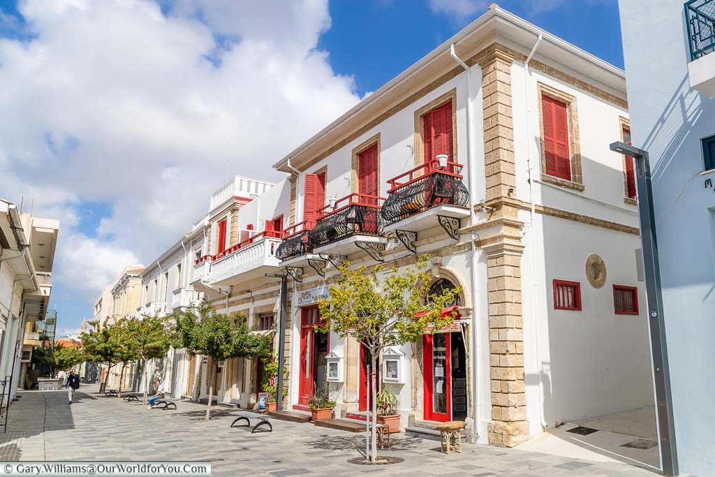 A street in Old Town Paphos lined with beautifully restored classic buildings