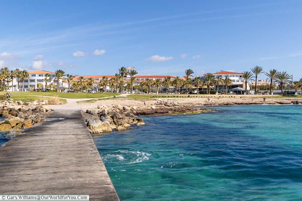 The view from the jetty into the Mediterranean sea back to the Olympic Lagoon Resort Paphos