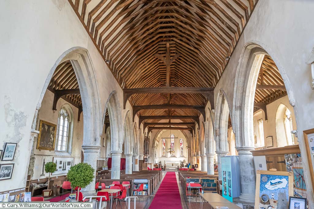 The huge wooden vaulted roof of the historic All Saints Church, Lydd runs for nearly 61 metres