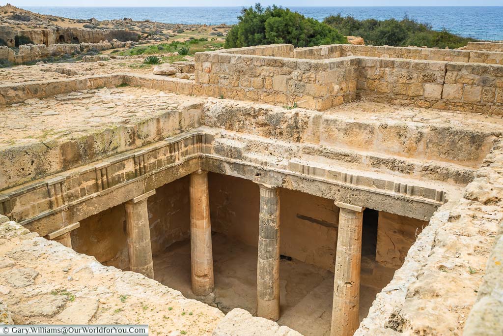 Looking down to the columns that line the inner chamber of Tomb 3 in the Tombs of the Kings in Paphos, Cyprus