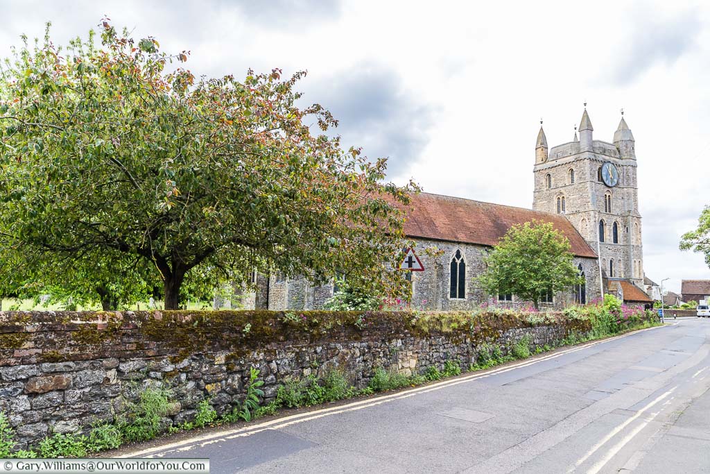 The traditional Norman, stone-built, St Nicholas Church in New Romney, Kent