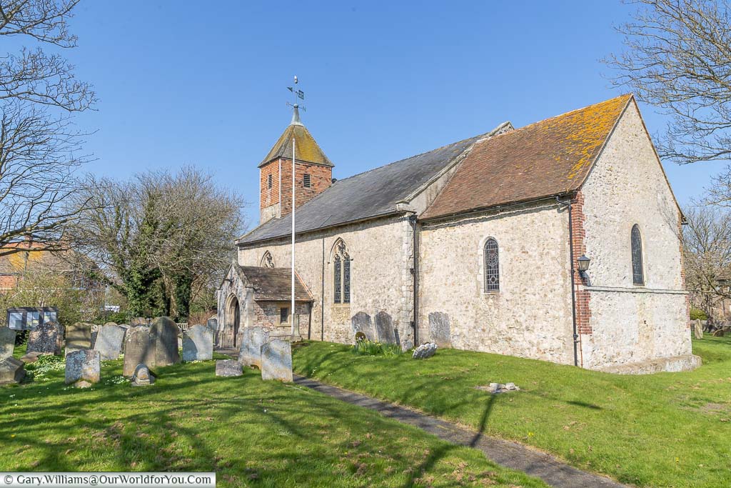 The outside of the historic St Peter & St Paul's Church in Dymchurch on the Romney Marsh in Kent