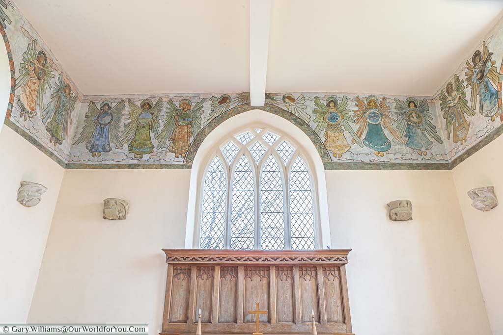 The beautiful angel frieze at the nave end of St. Mary Church in East Guldeford, East Sussex