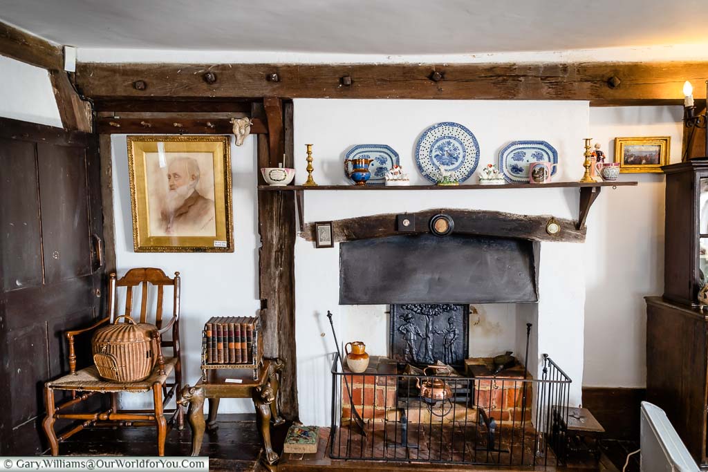 The traditional fireplace inside the 15th-century half-timbered Smallhythe Place in Kent