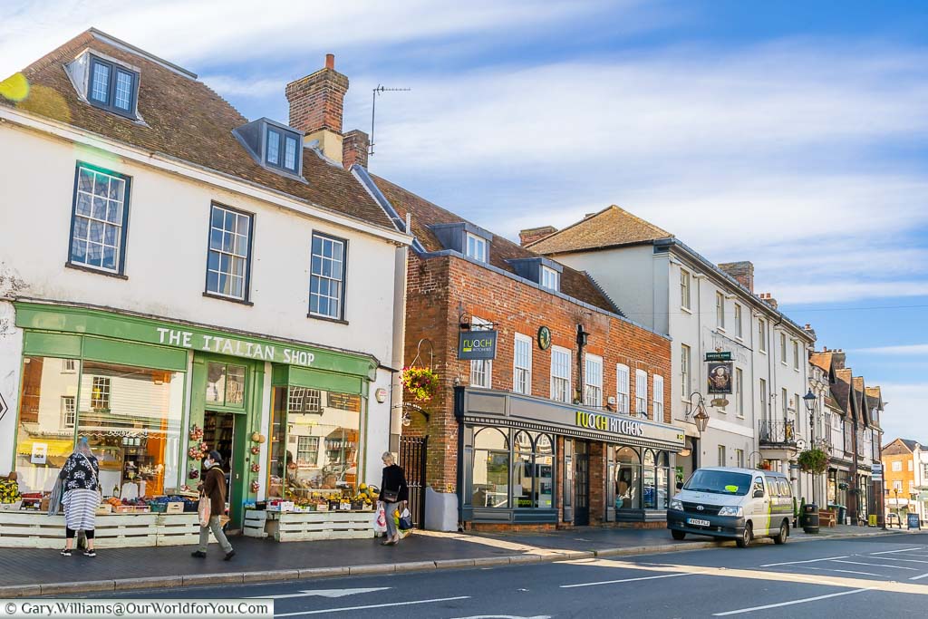 Shops on the southern half of Market Square in Westerham, dissected by the A25 trunk road