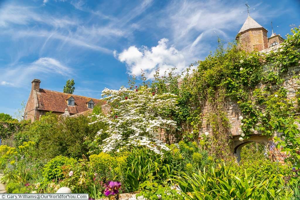 A mass of planting against the walls of the Sissinghurst Castle Gardens