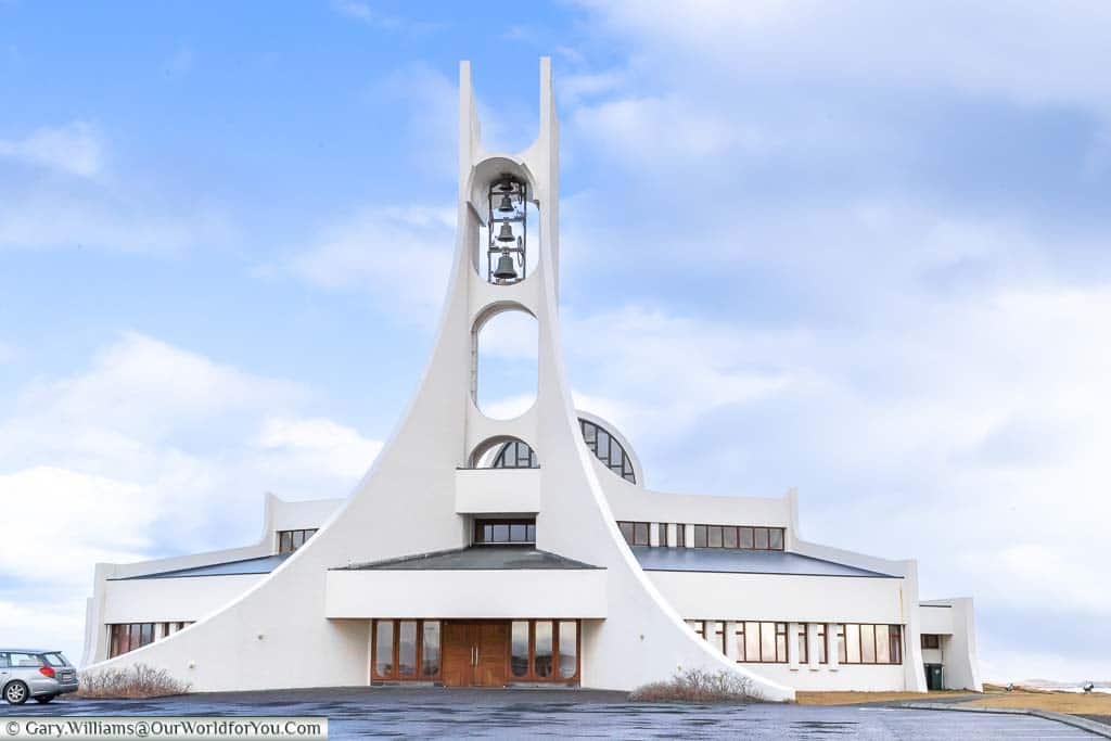 A stylish, white, modernist church in Stykkishólmur