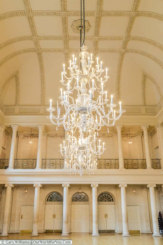 A beautiful lit chandelier in the Ballroom in the Georgian Bath Assembly Rooms