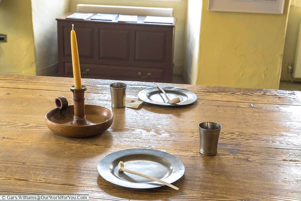 A pair of simple plates on the table in the Servants’ Hall of number one royal crescent, bath