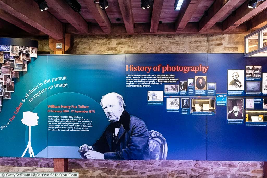 An information board detailing the history of photography inside the Fox Talbot Museum at Lacock Abbey in Wilshire