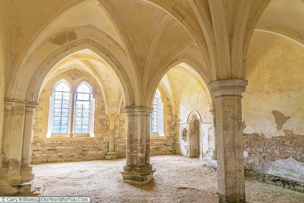 The Sacristy with its stone columns and vaulted ceiling in Lacock Abbey, Wiltshire