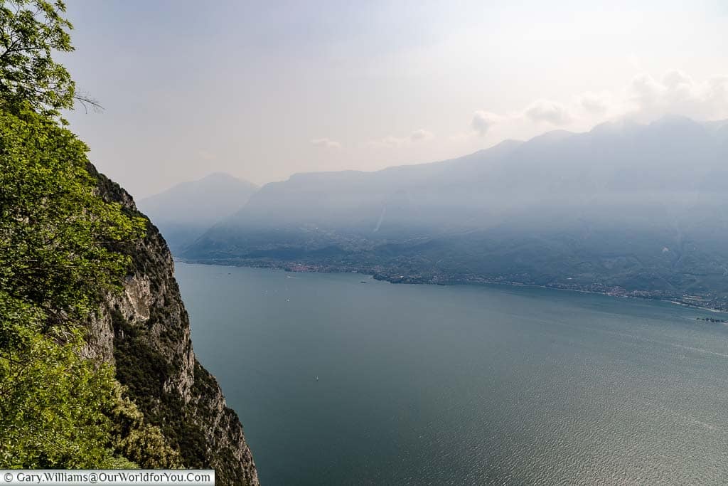 A view from up high, outside Sanctuary of Montecastello, across a hazy Lake Garda.