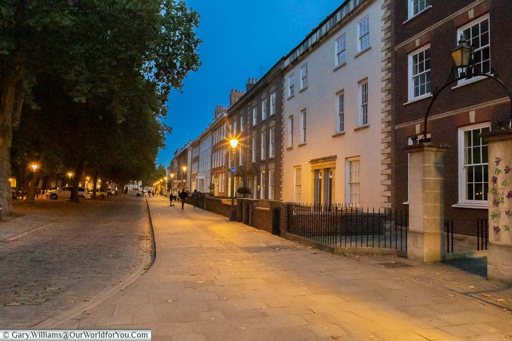 The historic streets around Queen Square in Bristol after dusk.