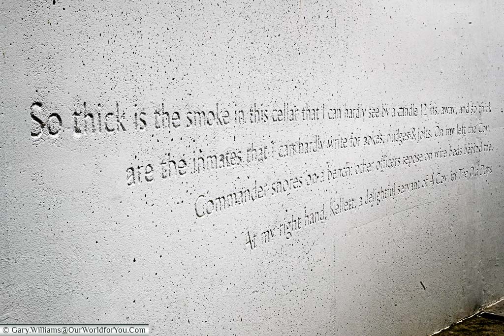 The words to Wilfred Owen's last letter etched onto a curved wall leading to the Forester's House in Pommereuil, France