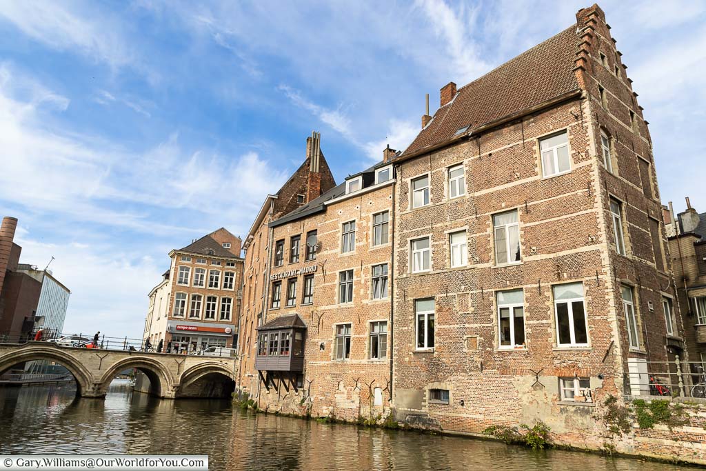 Historic buildings along the edge of the River Dyle, as seen from the boat trip in Mechelen.