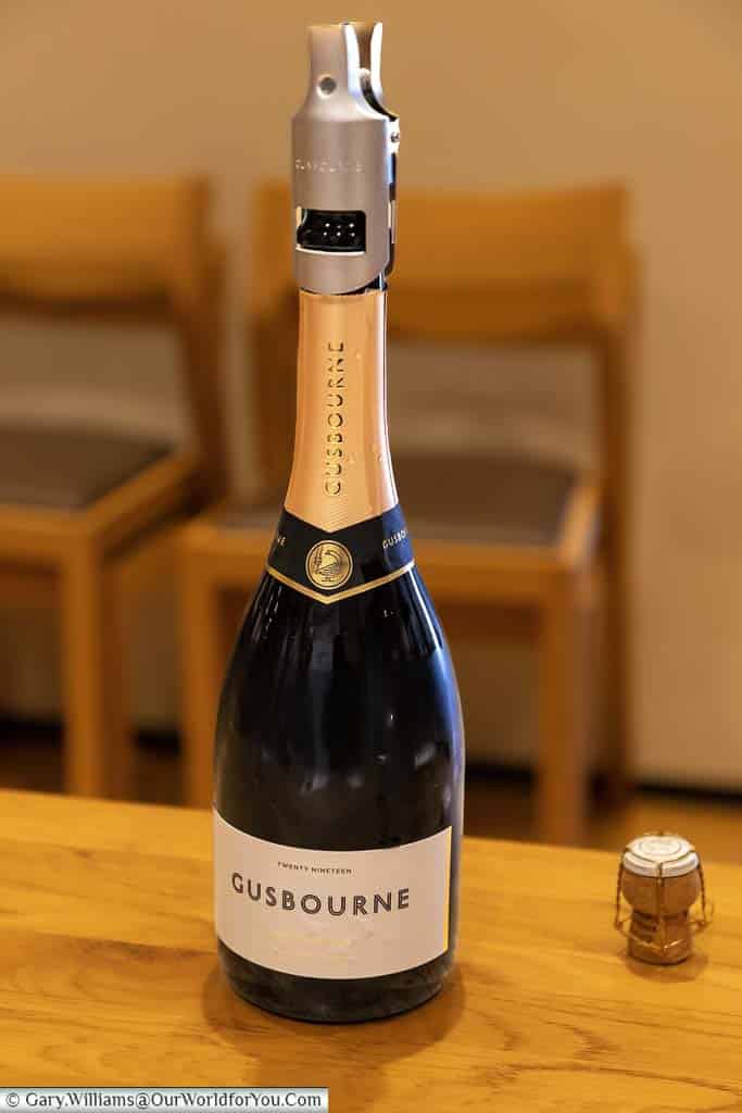 A bottle of the 2019 Brut Reserve opened ready for tasting at the Gusbourne Wines Estate in Kent