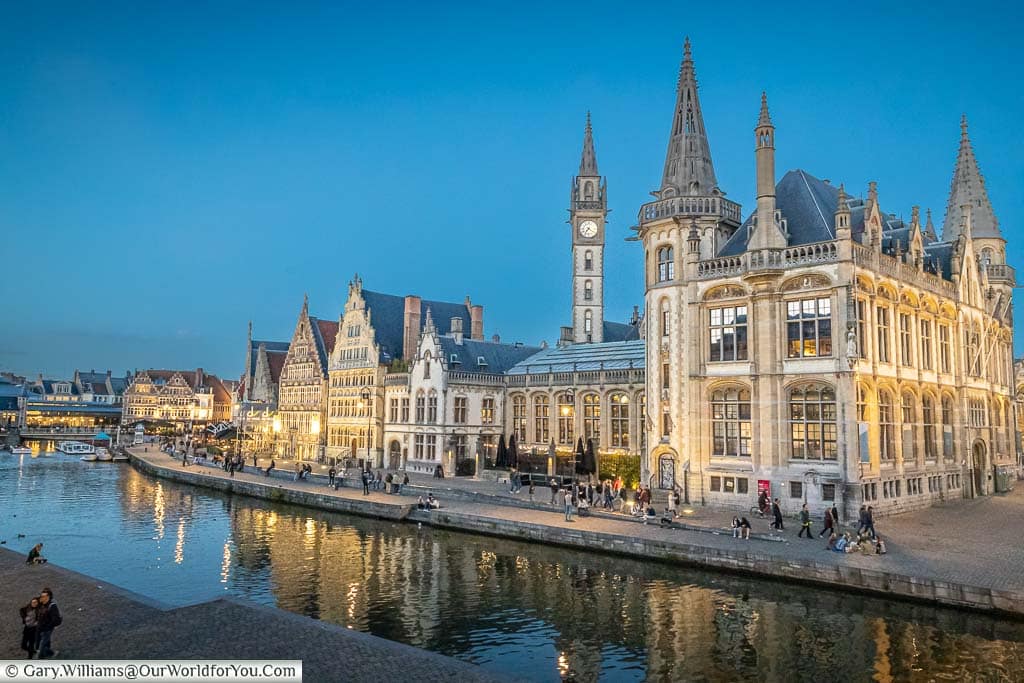 A view of the Graslei in Ghent, Belgium, at dusk from Sint-Michielsbrug bridge across the River Leie