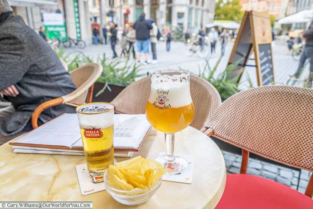 A Stella Artois beer, and a Karmeliet ale at a cafe in Grote Markt, Leuven
