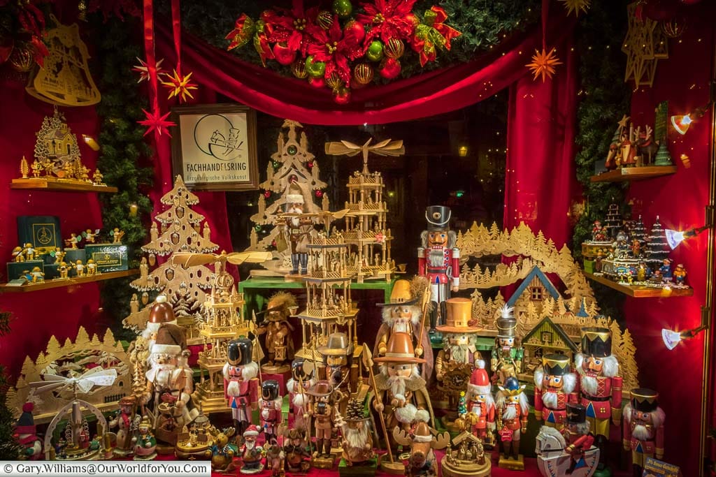 A traditional Christmas window display in Rothenburg ob der Tauber.  Full of traditional nutcrackers, Christmas pyramids and advent trees,