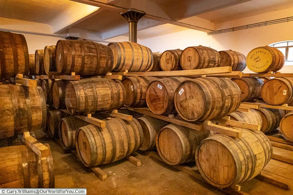 Oak barrels of the gouden carolus whisky secured under lock and key at the het anker brewery in mechelen, belgium