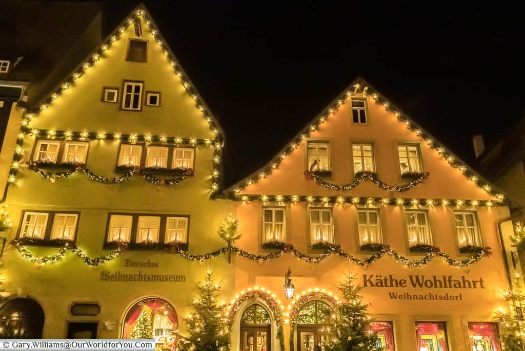 The decorated shop fronts of the käthe wohlfahrt's christkindlmarkt in rothenburg ob der tauber at night