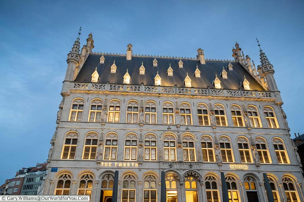 The Forth Hotel on Grote Markt in Leuven at dusk.