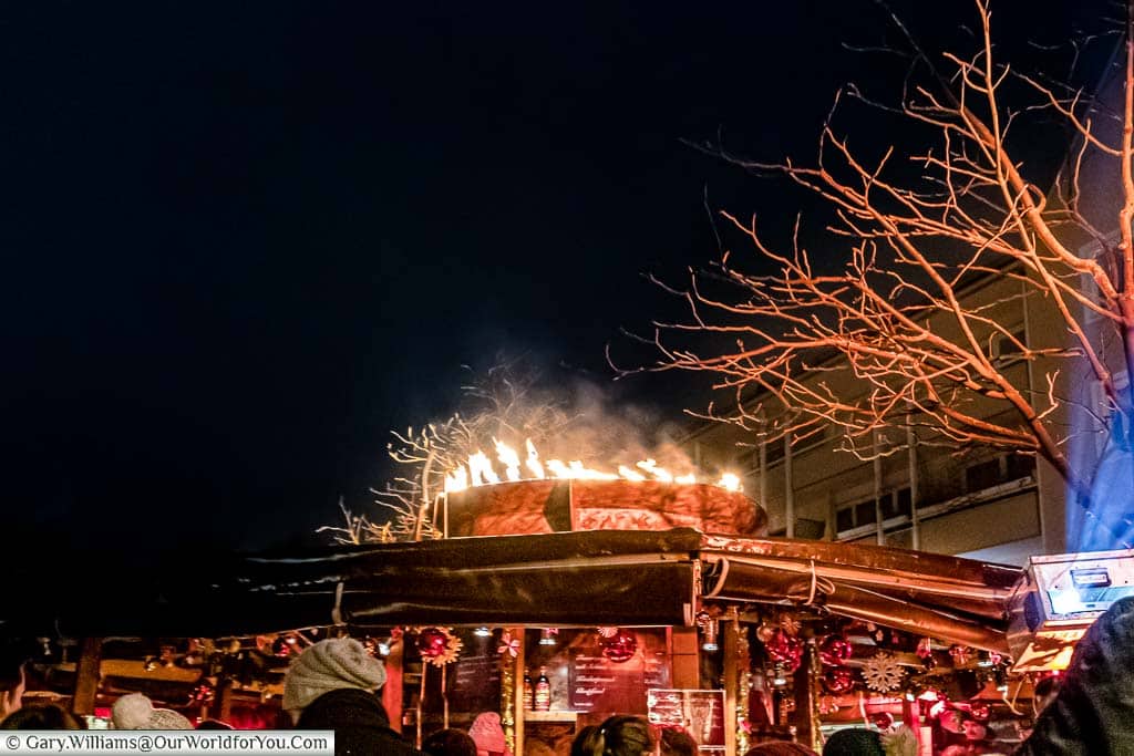 The giant flaming punchbowl atop a drinks cabin in one of Nuremberg's Christmas Markets