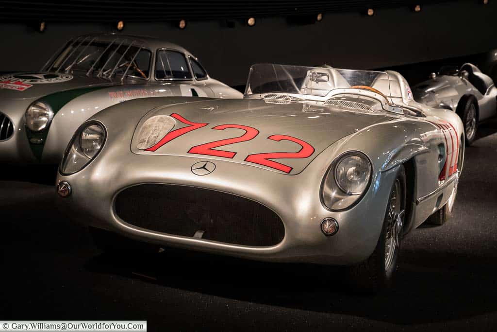 Sir Stirling Moss's 1955 Mille Miglia-winning 300 SLR on display on a banked section of 'track' inside the mercedes benz museum in stuttgart